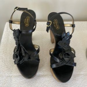 Coach size 8 platform heels with black leather flower